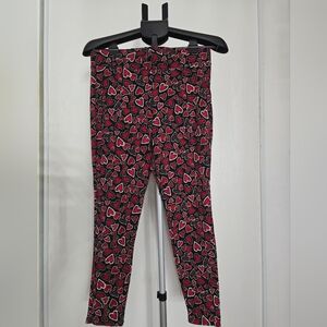 Torrid Black and Red Heart Pattern Leggings